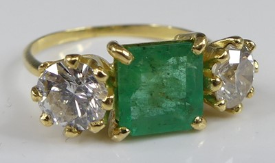 Lot 2258 - A yellow and white metal, emerald and diamond...