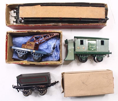 Lot 139 - Four Hornby goods wagons & snowplough: 1923-4...