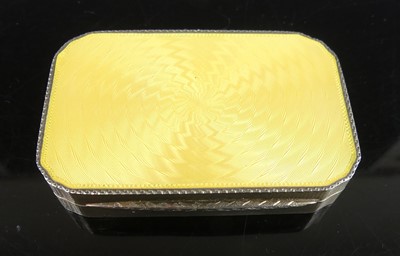 Lot 142 - An Art Deco silver and yellow guilloche enamel...