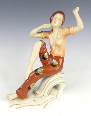 Lot 24 - A 1930s Royal Dux porcelain figure of a seated...