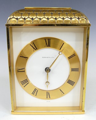 Lot 217 - A 1970s Tiffany & Co brass cased desk clock,...