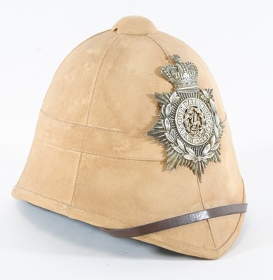 Lot 696 - A Foreign Service cloth covered pith helmet,...