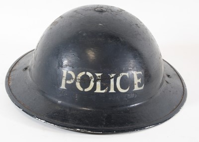 Lot 614 - A WW II Brodie pattern Home Guard helmet,...