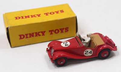 Lot 1036 - Dinky Toys 108 MG Midget, red body with red...