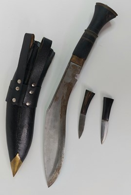 Lot 547 - A kukri knife in sheath