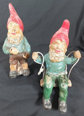 Lot 530 - Two terracotta gnomes, one modelled seated, h....