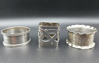 Lot 282 - A WMF celtic design napkin ring and two others...