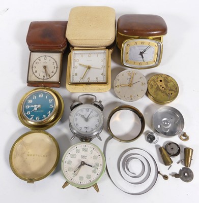 Lot 557 - A box of bedside/ travel clocks