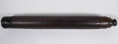 Lot 552 - A leather bound telescope