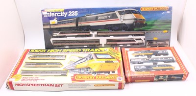 Lot 693 - Three early Hornby train sets to include an...