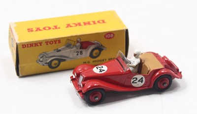 Lot 1039 - Dinky Toys 108 MG Midget, red body with red...