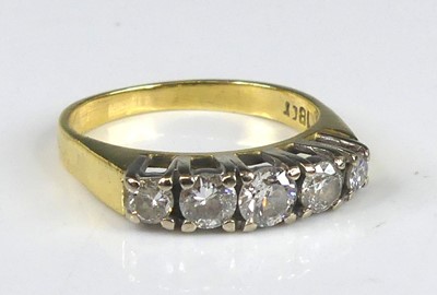 Lot 2270 - An 18ct gold diamond half eternity ring,...