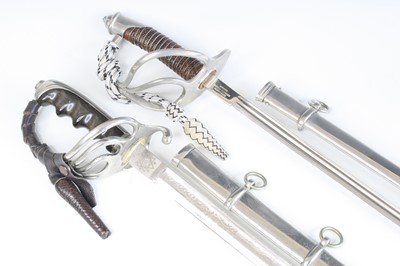 Lot 554 - A reproduction U.S. 1902 pattern sword, the...