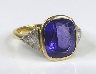 Lot 2227 - An 18ct yellow and white gold, tanzanite and...