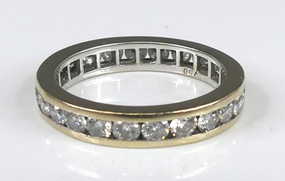 Lot 2242 - A white metal diamond eternity ring, having 25...