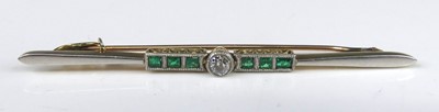 Lot 2241 - A yellow and white metal, emerald and diamond...