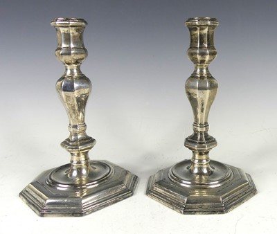 Lot 2189 - A pair of silver table candlesticks in the...