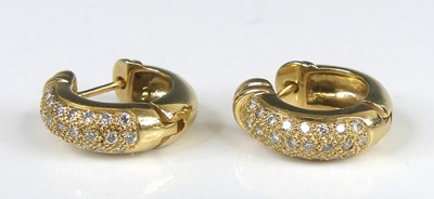 Lot 2246 - A pair of yellow metal diamond hinged huggy...