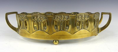 Lot 223 - An Art Deco brass oval planter in the manner...