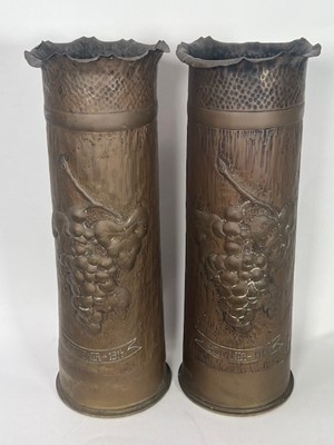 Lot 654 - A pair of WWI trench art shell cases with...