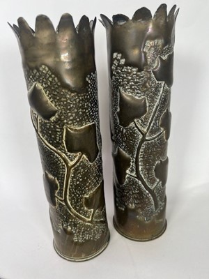 Lot 703 - A pair of WWI trench art shell cases with...