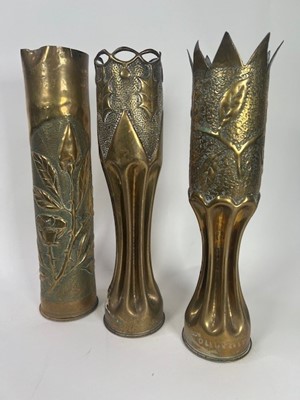 Lot 744 - A trio of WWI trench art shell cases with...