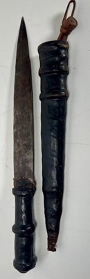 Lot 659 - A 19th Century African short sword / hunting...