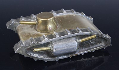 Lot 565 - A WW I trench art model of a tank,...