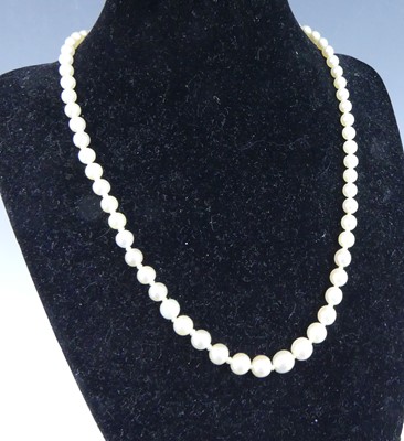 Lot 2224 - A cultured pearl necklace, arranged as 67...