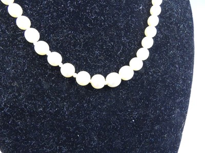 Lot 2503 - A cultured pearl necklace, arranged as 67...