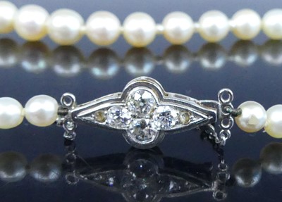 Lot 2503 - A cultured pearl necklace, arranged as 67...