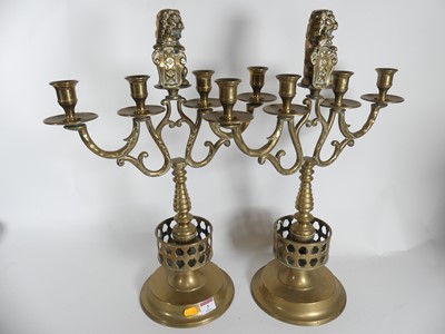 Lot 3 - A pair of four branch brass candelabras...