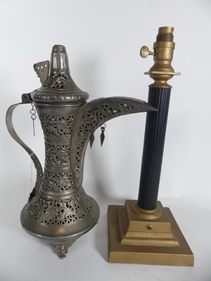 Lot 5 - A metal dalah coffee pot together with a doric...