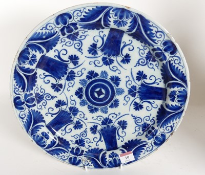 Lot 10 - An 18th century Delft charger, blue & white...