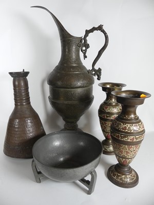 Lot 13 - A large metal Persian inspired jug, together...