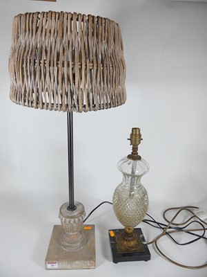 Lot 20 - A wooden lamp with wicker shade, together with...