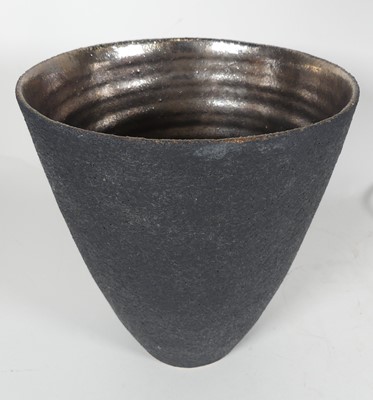 Lot 23 - A studio pottery textured vase with glazed...