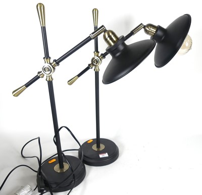 Lot 24 - A pair of modern adjustable table lamps in...