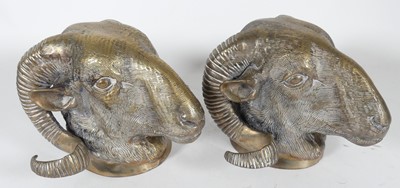 Lot 38 - A pair of hollow cast brass ram's heads