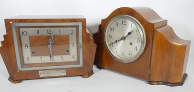 Lot 60 - An Art Deco style mantel clock with plaque to...