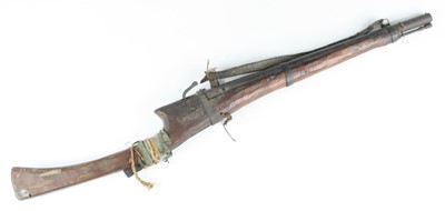 Lot 715 - A 19th century matchlock rifle, having a 50cm...