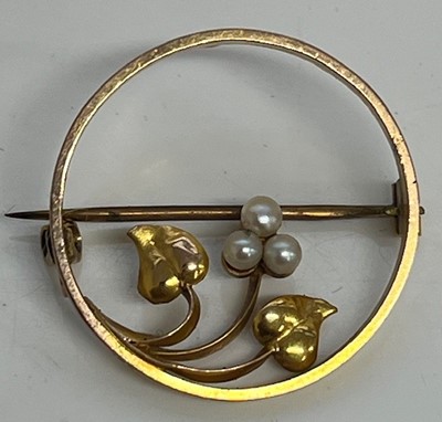 Lot 328 - A 9ct gold and seed pearl set openwork brooch,...