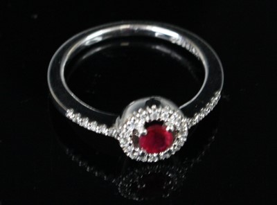 Lot 347 - A modern 14ct white gold ruby and diamond...