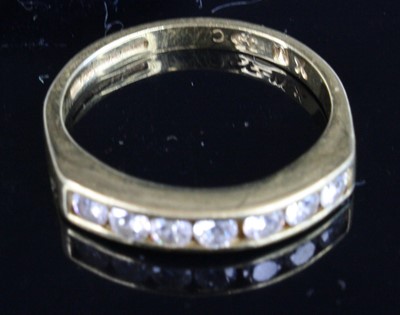 Lot 354 - An 18ct gold diamond half hoop ring, arranged...