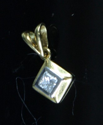 Lot 360 - An 18ct gold diamond set lozenge pendant,...