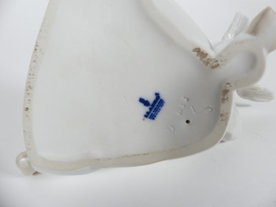 Lot 198 - A collection of ceramic figures to include two...