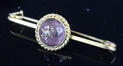 Lot 362 - A 9ct gold cabochon amethyst and rose cut...