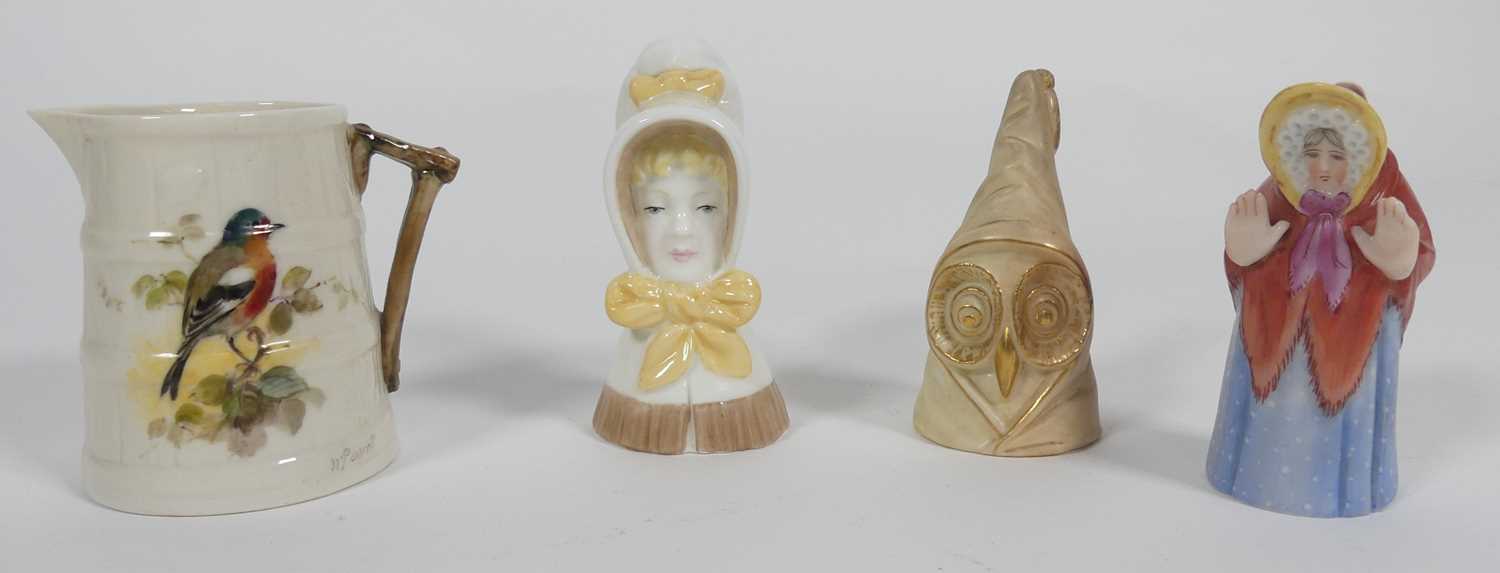 Lot 199 - Three Royal Worcester candle snuffers,...