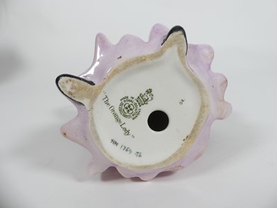 Lot 214 - A collection of Royal Doulton figures to...