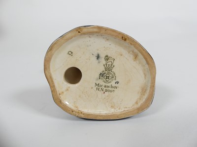 Lot 214 - A collection of Royal Doulton figures to...